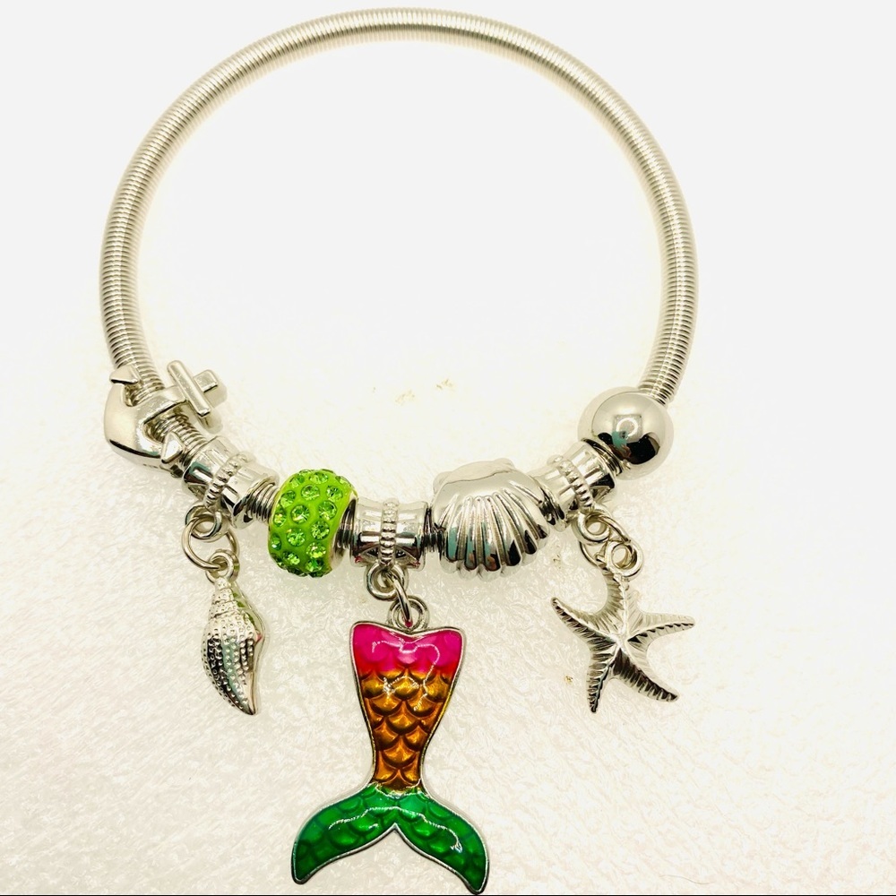 Bracelet Mermaid Crystal on Silver tone wire. Won’t Tarnish or Stretch out.